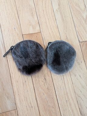 Two handcrafted seal skin and leather coin pouches